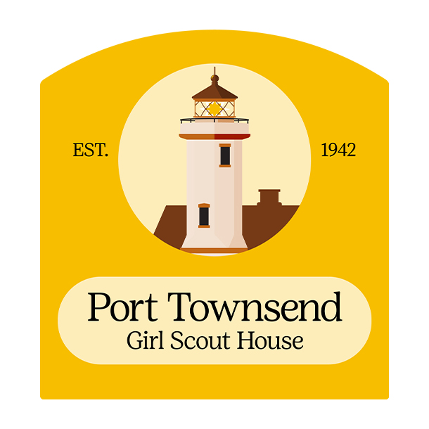 An exterior view of the Port Townsend Girl Scout house. It is yellow with green trim and a red door. There is a cement walkway surrounded by grass and shrubs. 
